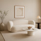 Curved Sofa Upholstered In White Bouclé – Modern And Elegant Design - Sorela