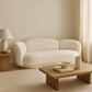 Curved Sofa Upholstered In White Bouclé – Modern And Elegant Design - Sorela