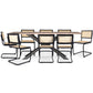 Conjunto de mesa de madeira industrial (200cm) e 8 cadeiras de rattan entrançado e madeira preta - Bastral