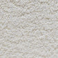Banco-pufe de toucador em bouclé branco – Loui